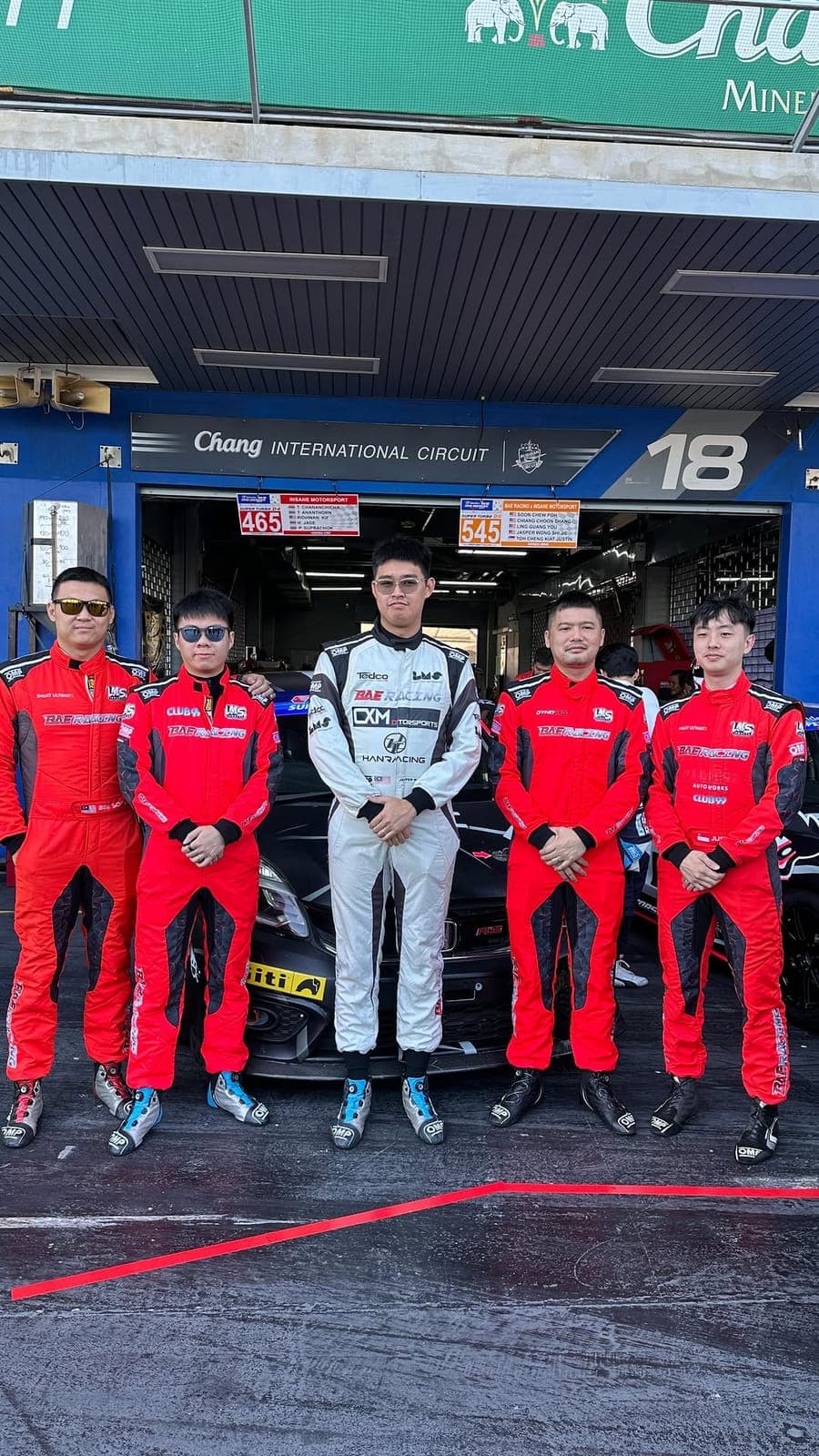 Redline team in the pit lane