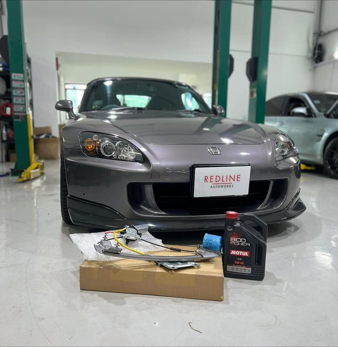 Grey Honda S2000 with Moty's oil